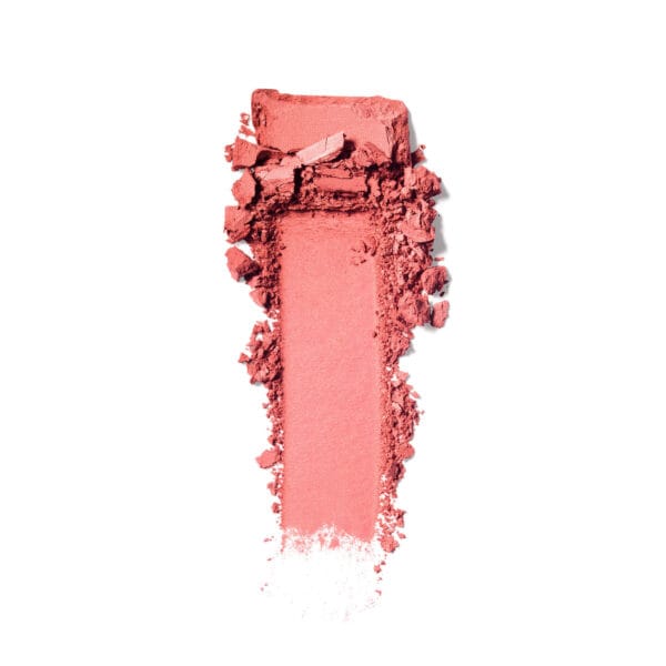 Polvo de maquillaje rosa triturado para belleza y cosmética.